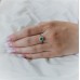 Λευκόχρυσο δαχτυλίδι ροζέτα Κ18 με σμαράγδι και διαμάντια